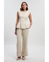 Karen Millen - Tencel Cotton Contrast Zip Up Woven Peplum Top - Lyst