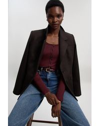 Karen Millen - Viscose Rib Button Up Scoop Neck Long Sleeve Bodysuit - Lyst