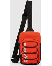 KL Jeans - Utility Drawstring Sling Bag - Lyst
