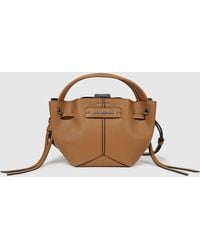 KARL LAGERFELD - K/Pierced Mini Bucket Bag - Lyst