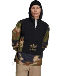 tan adv windbreaker