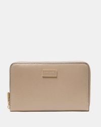 Kate Spade - Serena Medium Zip Around Wallet - Lyst