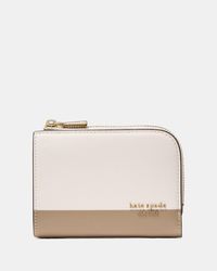 Kate Spade - Kate Spade Devin Colorblocked Small Compact Wallet - Lyst