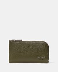 Kate Spade - Devin Small Slim Bifold Wallet - Lyst