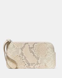 Kate Spade - Kate Spade Zippy Snake Embossed Wristlet - Lyst