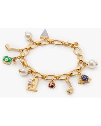 Kate Spade - Hole In One Statement Charm Bracelet - Lyst