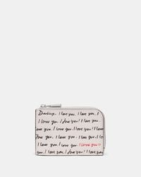 Kate Spade - Embossed Leather Mini Zip Card Case - Lyst