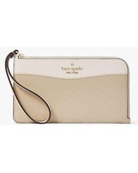 Kate Spade - Lucy Colorblock Pebbled Leather Medium L-Zip Wristlet, Light Sand - Lyst