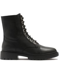 Kazar - Warme Schwarze Flache Stiefelette Für Damen Mit Reißverschluss Und Schnürung - Lyst