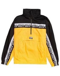 adidas - Originals Ryv Vocal Neon Tt 1/4 Zip Hidden Hoodie Jacket - Lyst
