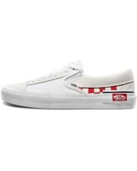Vans - Slip-On Cap Low Top Skate Shoes Grid - Lyst