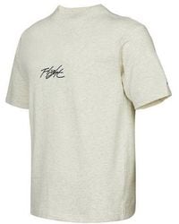 Nike - Flight Essentials Logo Sports Short Sleeve Creamy - Lyst