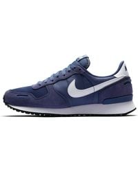 nike air vortex trainers in blue