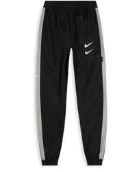 Nike - Sportswear Swoosh Woven Pants For - Lyst