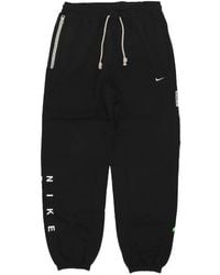 Nike - Standard Issue Pants - Lyst