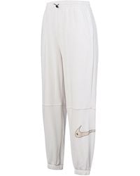 Nike - (Wmns) Casual Sports Stay Warm Bundle Feet Long Pants/Trousers - Lyst