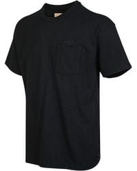 Nike - Solid Color Pocket Round Neck Loose Short Sleeve T-Shirt - Lyst