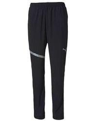 PUMA - Ignite Woven Running Pants - Lyst