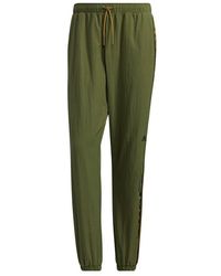 adidas - M Wrd Wov Pnt Contrasting Colors Woven Loose Bundle Feet Sports Pants - Lyst