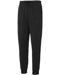 adidas - Essentials Fleece 3-Stripes Tapered Cuff Pants - Lyst