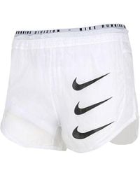 Nike - (Wmns) As Nk Run Dvn Tmpo Luxe 2In1 Sports Shorts - Lyst