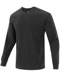 Nike - Solid Color Small Logo Round Neck Long Sleeves T-Shirt - Lyst