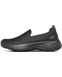 Skechers - (Wmns) Go Walk Arch Fit Slip On 'Triple' - Lyst