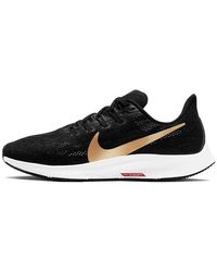 black and gold nike pegasus