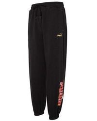PUMA - Essentials Cny Graphic Pants - Lyst