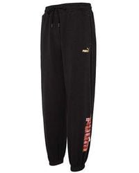 PUMA - Essentials Cny Graphic Pants - Lyst