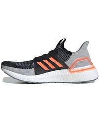 adidas - Ultraboost 19 'Core Solar' - Lyst