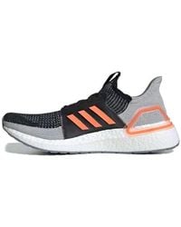 adidas - Ultraboost 19 'Core Solar' - Lyst