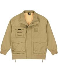 New Balance - Multiple Pockets Cargo Windproof Sports Logo Jacket Dark - Lyst