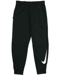 Nike - Therma Tapered Swoosh Fleece Lined Sports Training Long Pants - Lyst