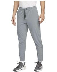 Nike - Dri-Fit Zippered Cuff Versatile Pants - Lyst