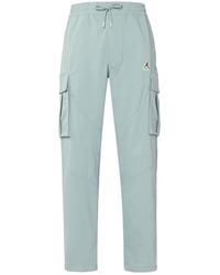 Nike - Utility Solid Color Big Pocket Cargo Casual Pants/Trousers Ocean Deep - Lyst