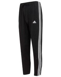 adidas - Logo Essentials Single Jersey Tapered Open Hem 3-Stripes Pants - Lyst