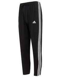 adidas - Logo Essentials Single Jersey Tapered Open Hem 3-Stripes Pants - Lyst