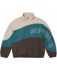Supreme Spellout-Embroidered Track Jacket in Black for Men Supreme Spellout-Embroidered Track Jacket in Black for Men