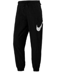 Nike - (Wmns) Sportswear Essential Mid-Rise Pants - Lyst