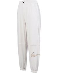 Nike - (Wmns) Casual Sports Stay Warm Bundle Feet Long Pants/Trousers - Lyst