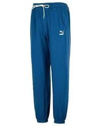 PUMA - Team Badge Sweatpants Tr Logo Pants - Lyst