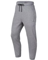 Nike - Logo Embroidered Knit Fleece Lined Bundle Feet Sports Pants - Lyst