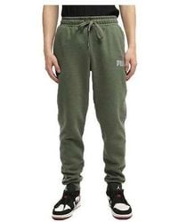 PUMA - Metallic Nights Tape Sweatpants - Lyst