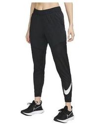 Nike - (Wmns) Dri-Fit Swoosh Run - Lyst