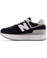 New Balance - Sneakers Black Sneakers 574 With Animalier Details - Lyst