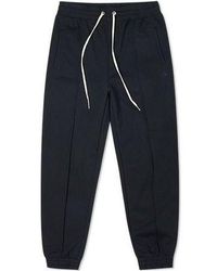 Converse - (Wmns) Solid Color Lacing Bundle Feet Sports Pants/Trousers/Joggers Dark - Lyst