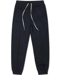 Converse - (Wmns) Solid Color Lacing Bundle Feet Sports Pants/Trousers/Joggers Dark - Lyst