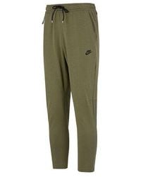 Nike - Solid Color Logo Training Fleece Bundle Feet Sports Pants/Trousers/Joggers Military - Lyst