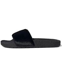 adidas - Adilette Boost Slides 'Triple' - Lyst